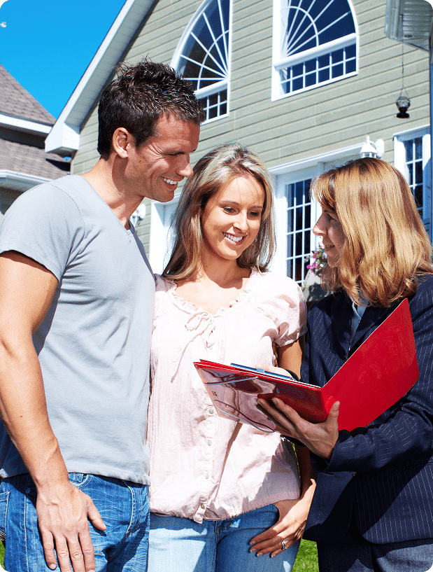 Homeowners discussing a property sale with a buyer
