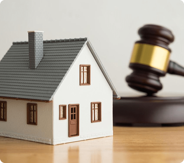 House with a real estate auction gavel