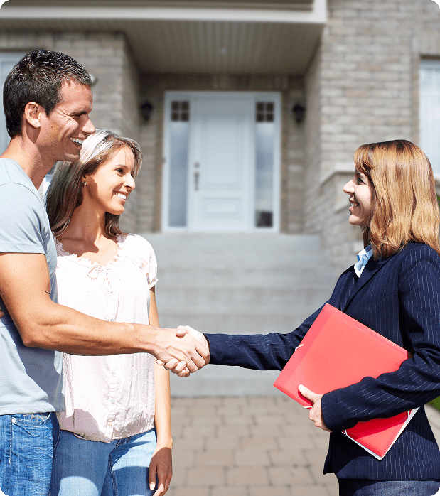 Homeowners meeting with a real estate professional