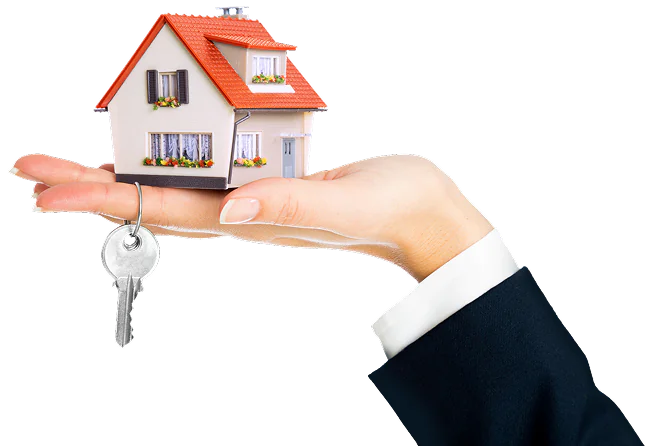 Hand holding a house with keys